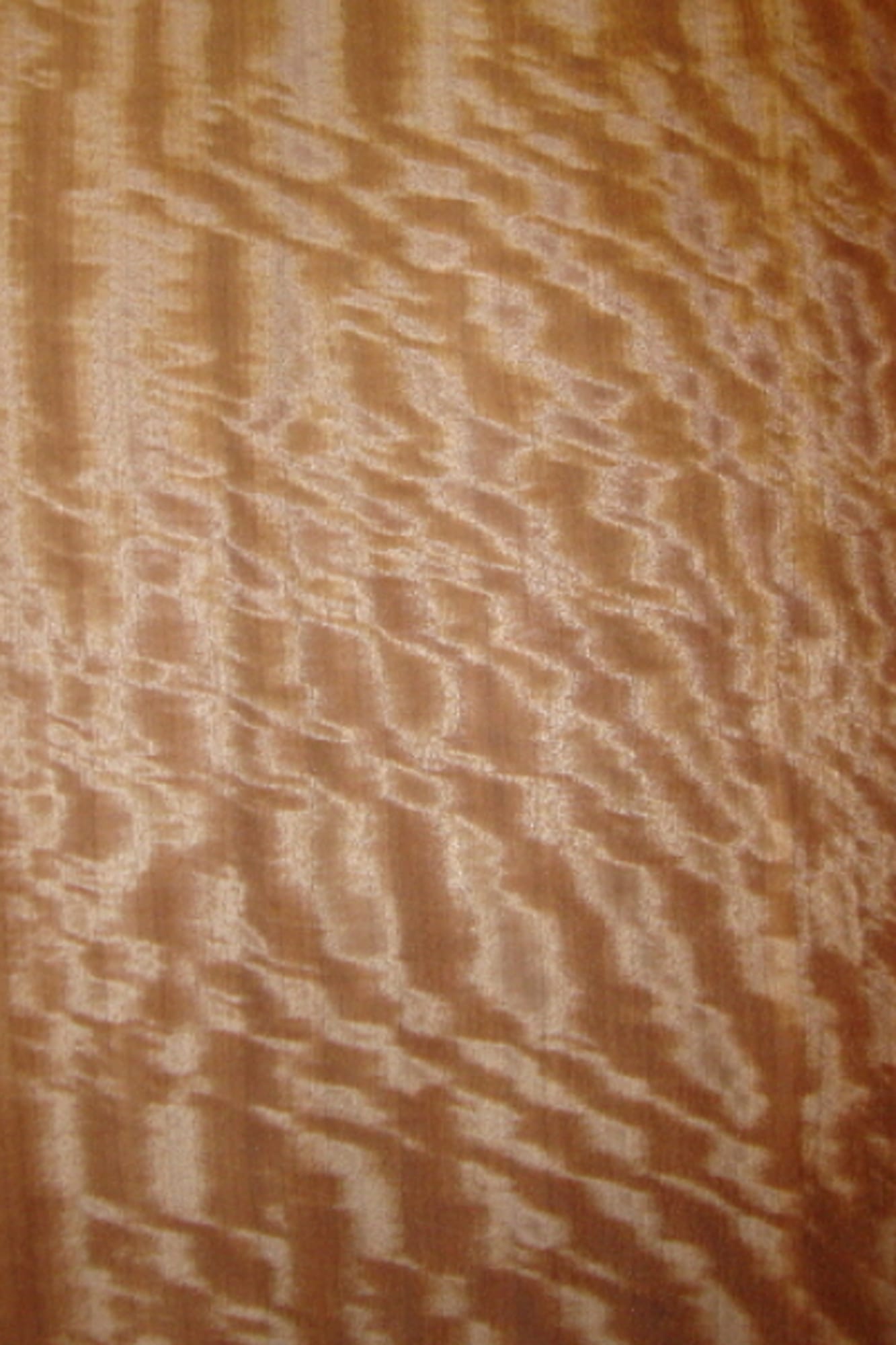 A sheet of Black Mottled Makore veneer