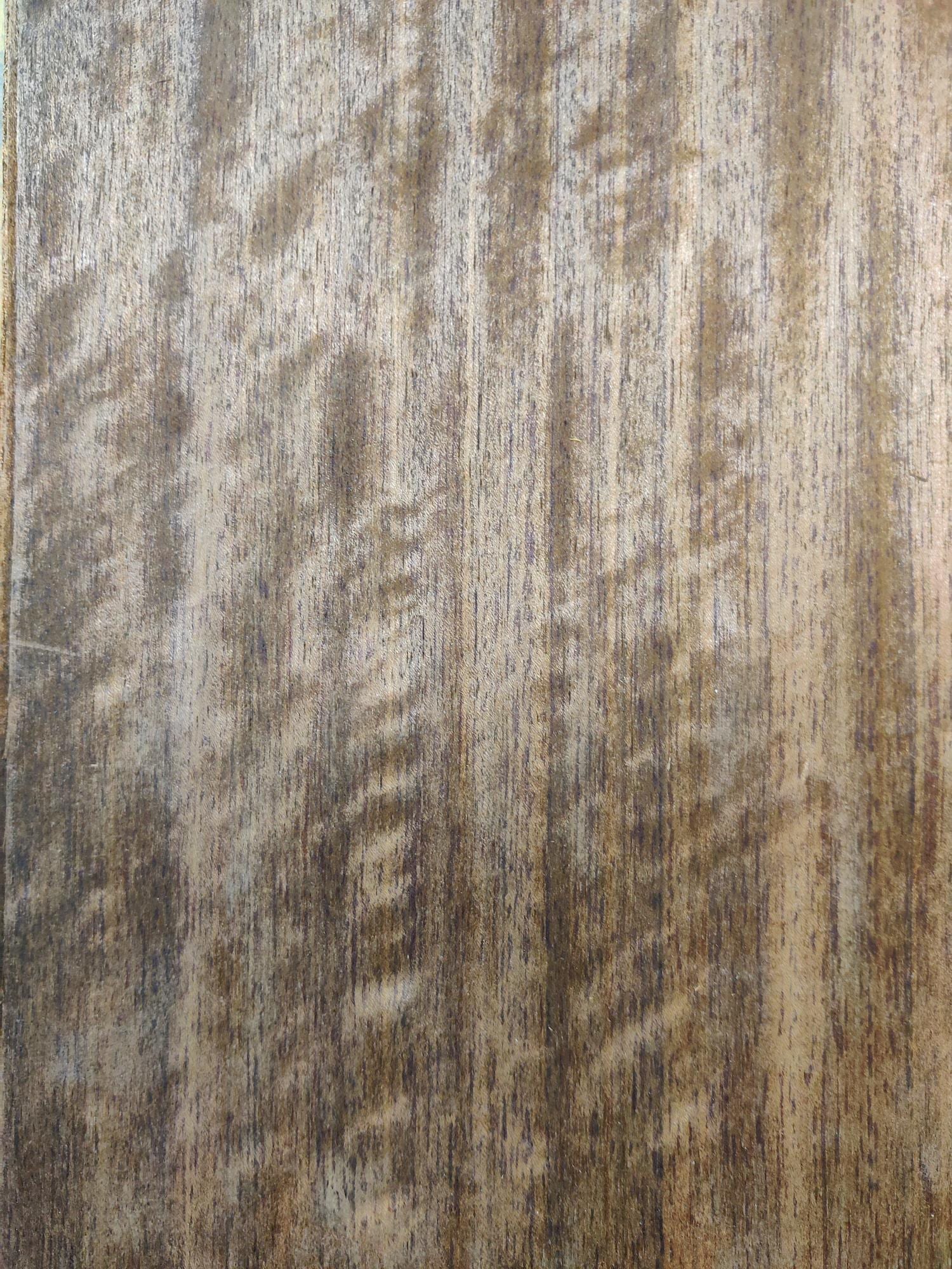 A sheet of Fumed Figured Etimoe veneer