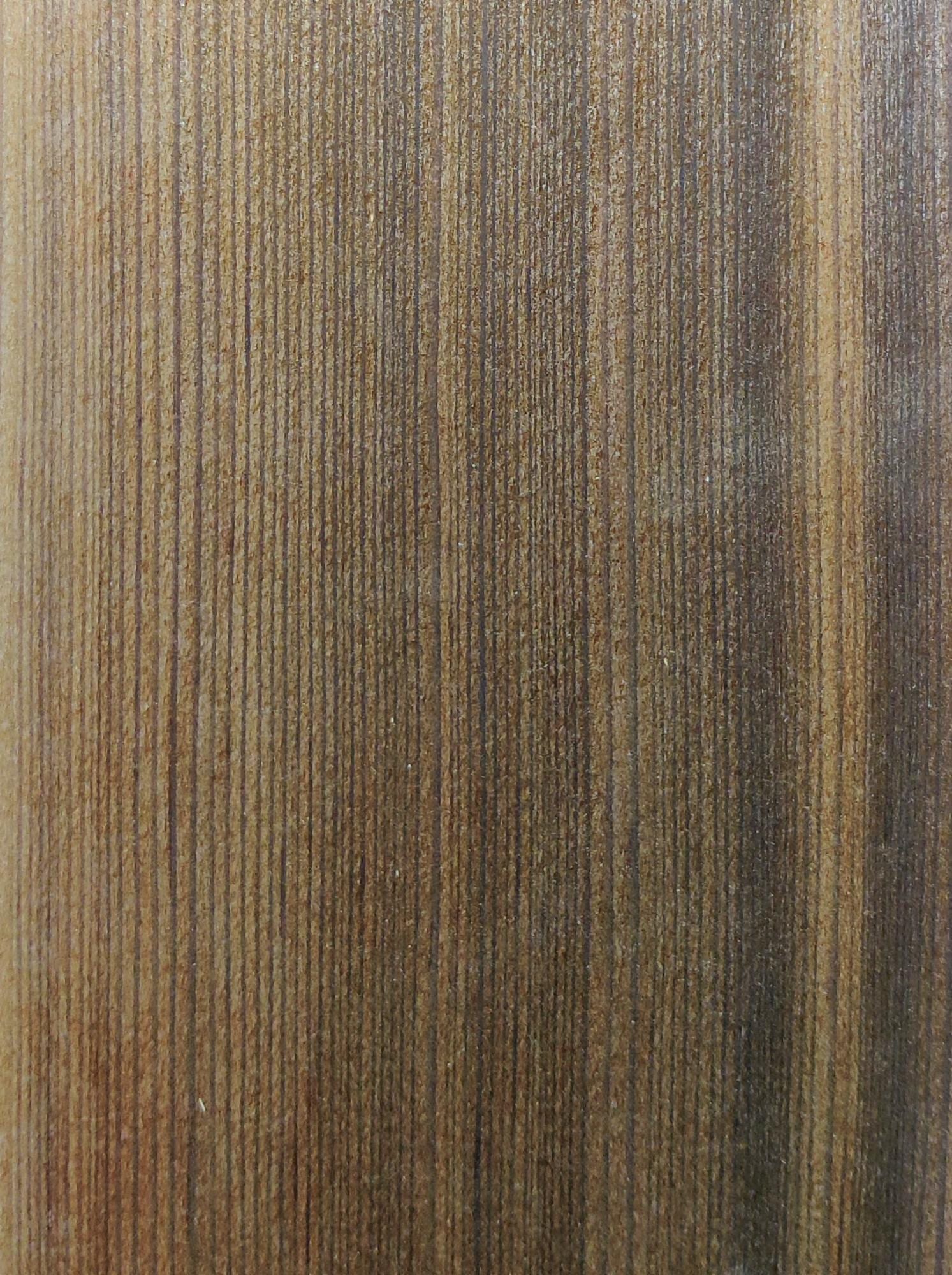 A sheet of Fumed Quartered Larch veneer